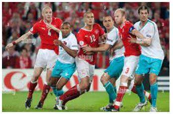 Jostling - Push, elbow, or bump against (someone) roughly, typically in a crowd.