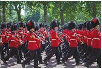Marched - Walk in a military manner with a regular measured tread.