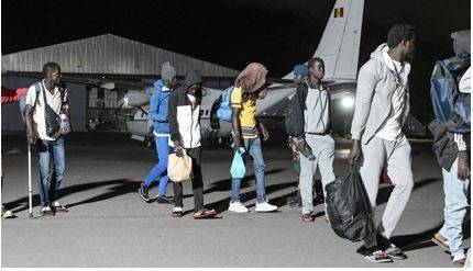 Repatriate - To send someone back to their own country.