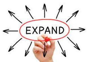 Expanding - To become or to make something bigger.