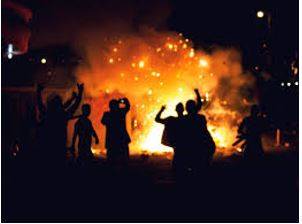 Rioting - Noisy, violent, and uncontrolled behaviour by a group of people in a public place, often as a protest.