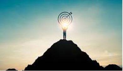 Achieving - To succeed in finishing something or reaching an aim, especially after a lot of work or effort.