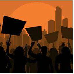 Protesting - A statement or action expressing disapproval of or objection to something.