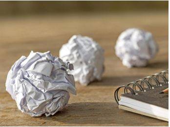 Crumpled - Something that is pressed, folded, or crushed into a wrinkled or creased form.