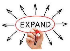 Expanding - To become or to make something bigger.