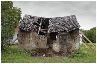Ruinous - Destroyed or severely damaged, especially to the point of being beyond repair or recovery.