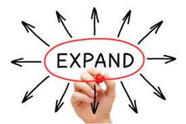 Expanded - To become or to make something bigger.