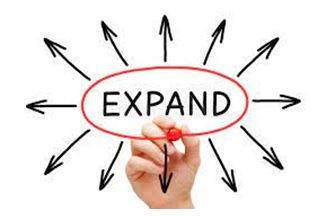 Expanded - To become or to make something bigger.