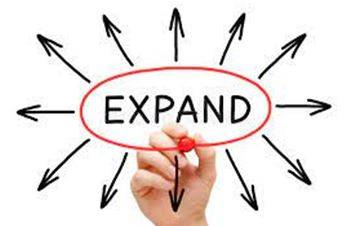 Expanded - To become or to make something bigger.