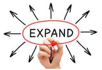 Expanded - To become or to make something bigger.