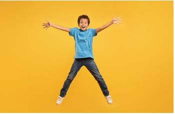 Ebullient - Cheerful and full of energy; overflowing with enthusiasm